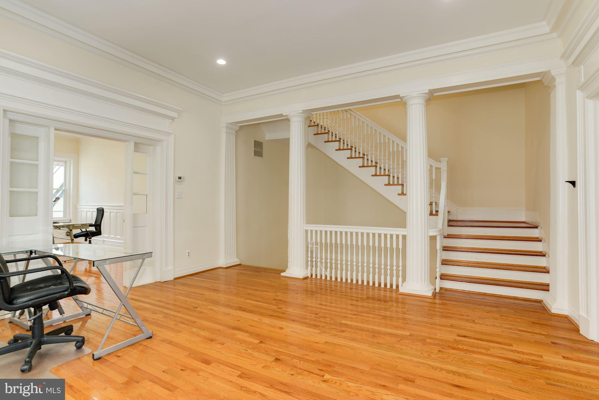 1609 22nd Street Northwest Washington, DC 20008 - Photo 6 of 24 a view of a room with wooden floor and windows