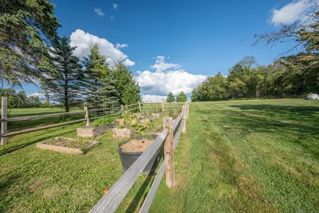 a view of a lake with a yard