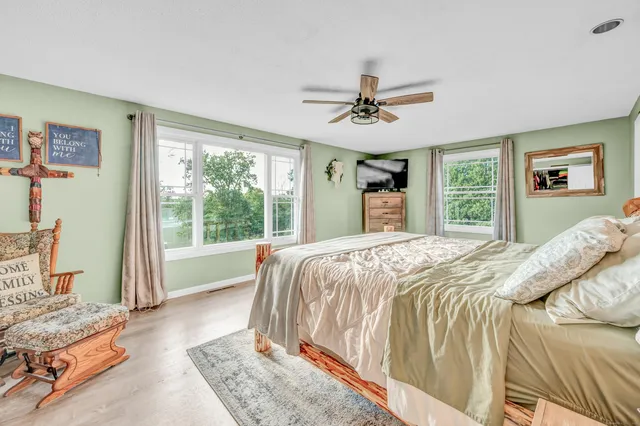 a view of a livingroom with furniture and workspace