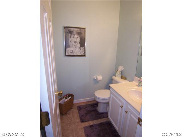 14101 Aldengate Road Midlothian, VA 23114 - Photo 11 of 21 Bathroom - Half bath on first level with new floor