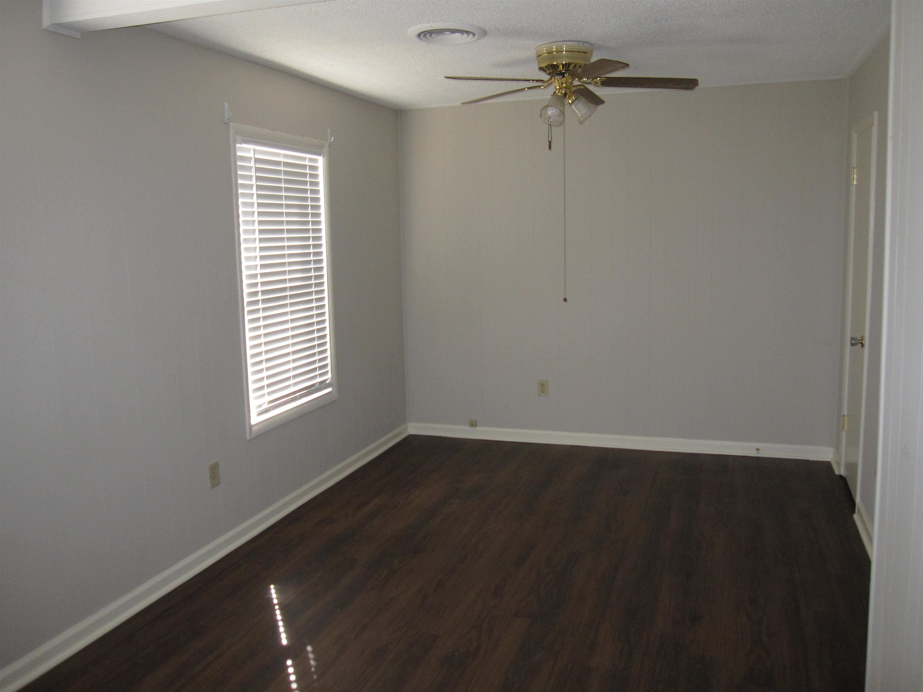 935 Poplar Leaf Road Collierville, TN 38017 - Photo 14 of 19 an empty room with a window