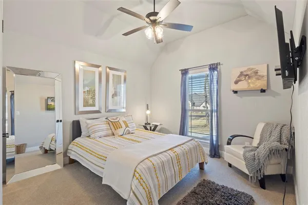 a bedroom with a bed and furniture