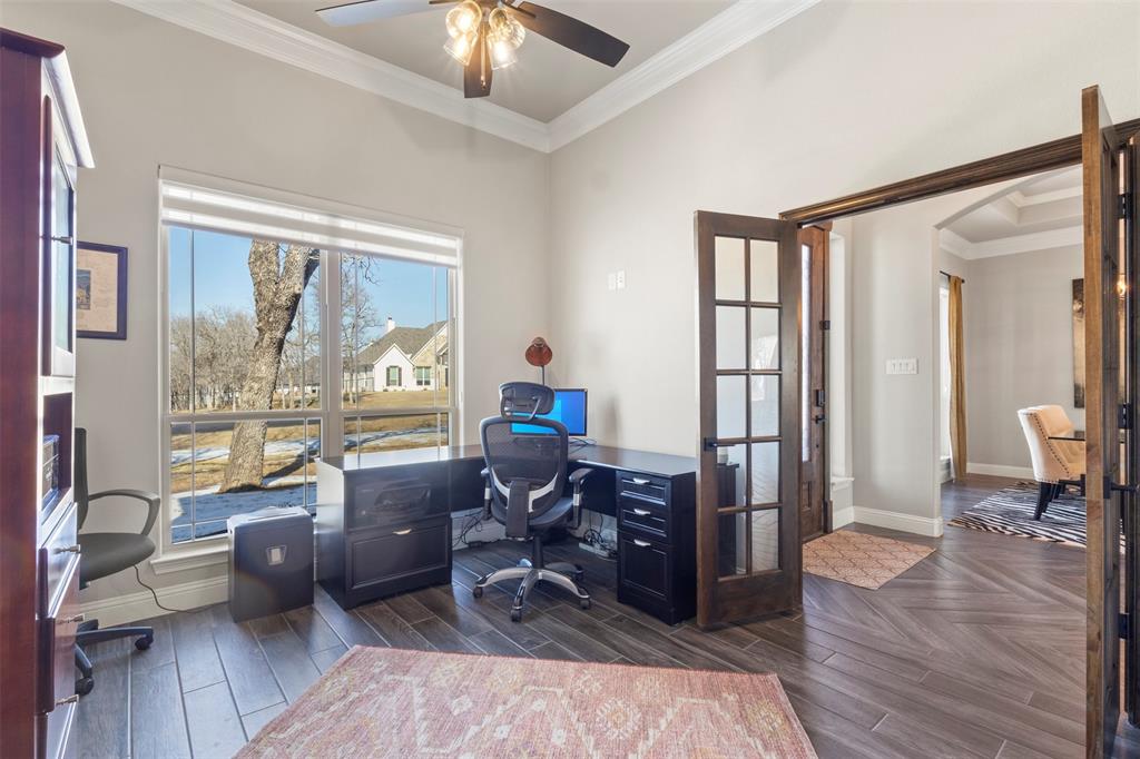 703 Winkler Way Springtown, TX 76082 - Photo 24 of 37 a living room with furniture and a large window