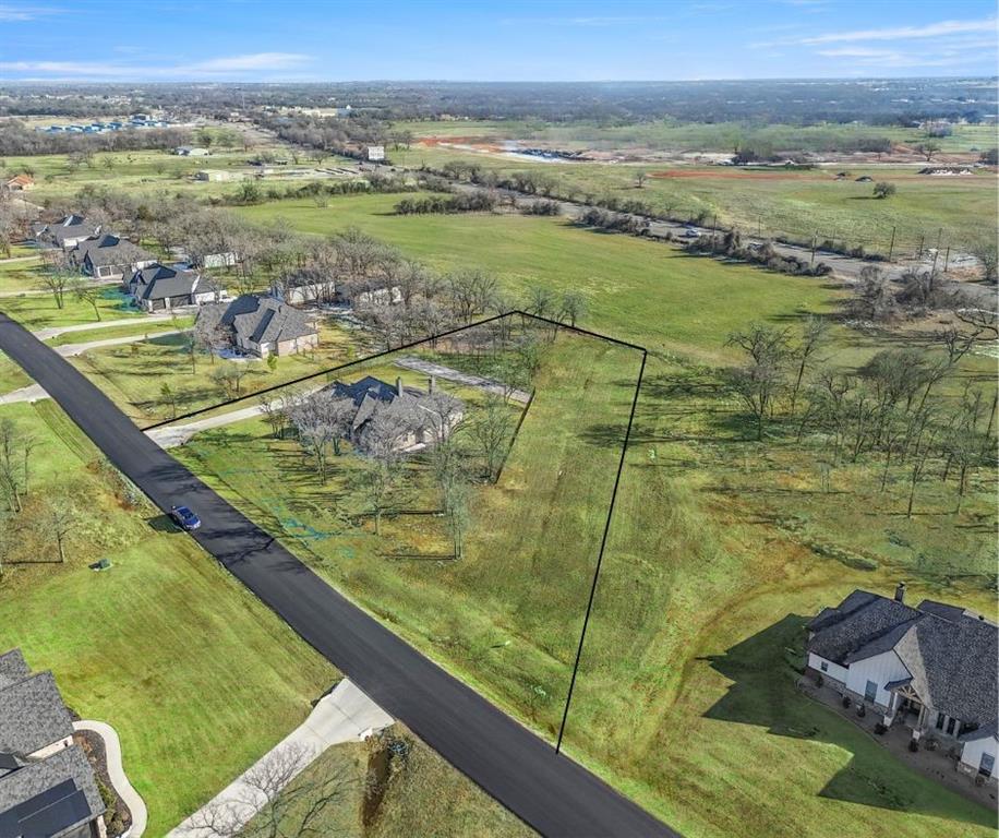 703 Winkler Way Springtown, TX 76082 - Photo 32 of 37 a view of a lake from a city view