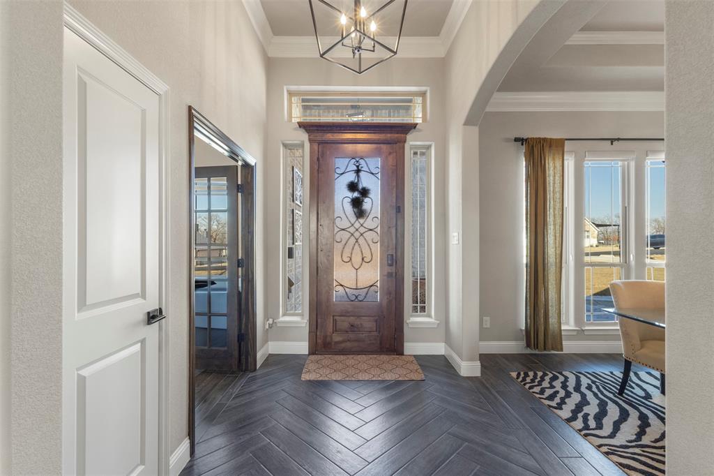 703 Winkler Way Springtown, TX 76082 - Photo 7 of 37 wooden floor in an empty room
