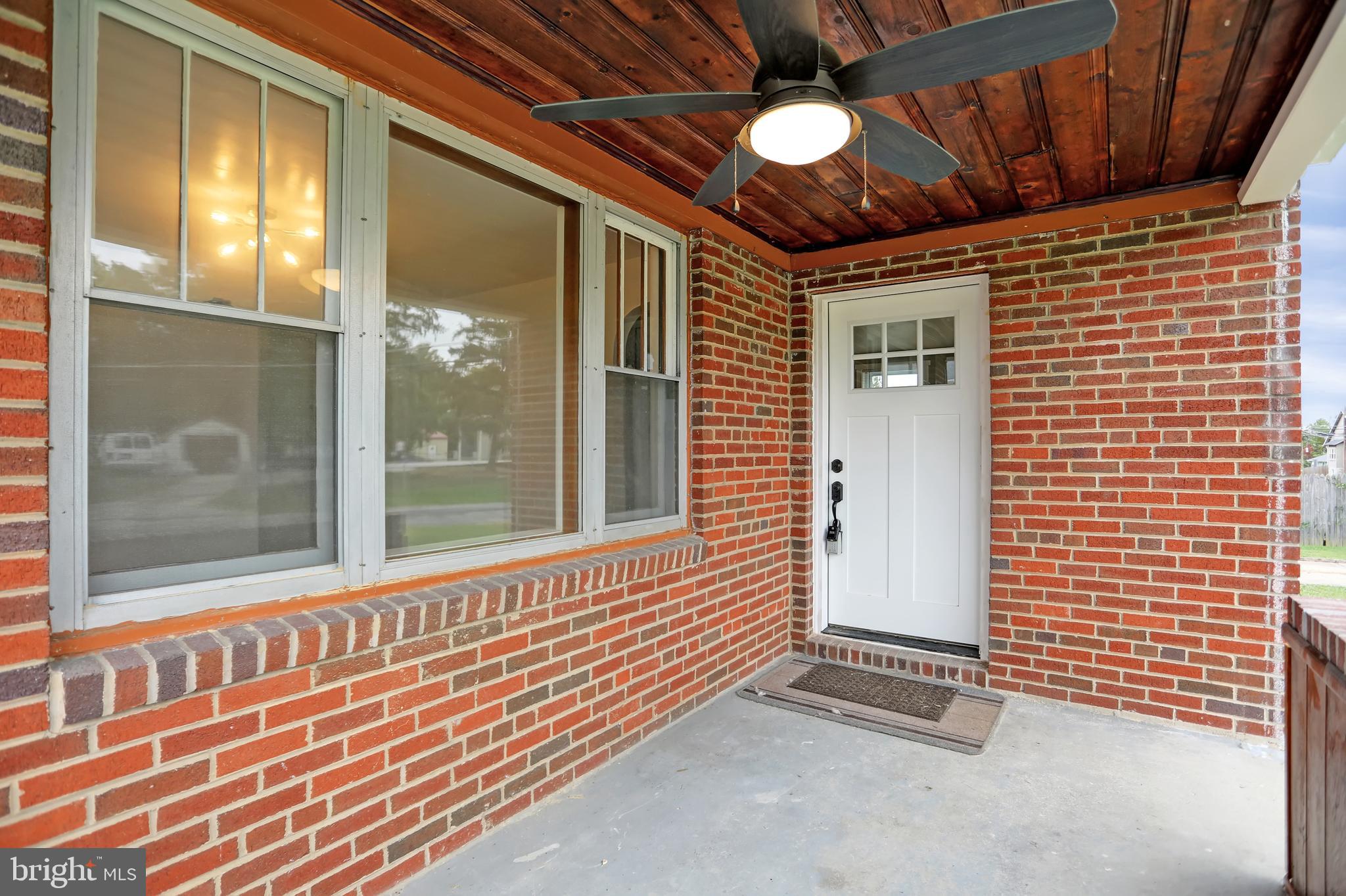 1309 Longview Avenue Rosedale, MD 21237 - Photo 9 of 34 Relaxing Front Porch With Ceiling Fan