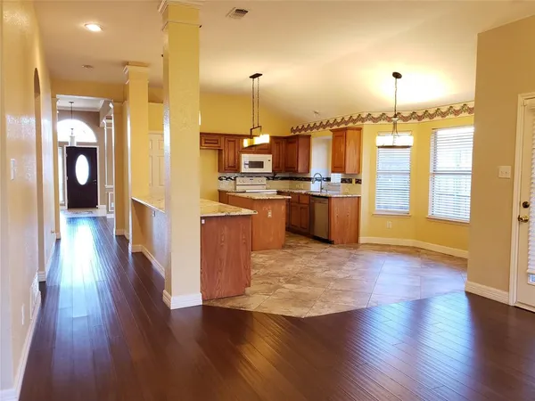 a large kitchen with lots of counter space and appliances
