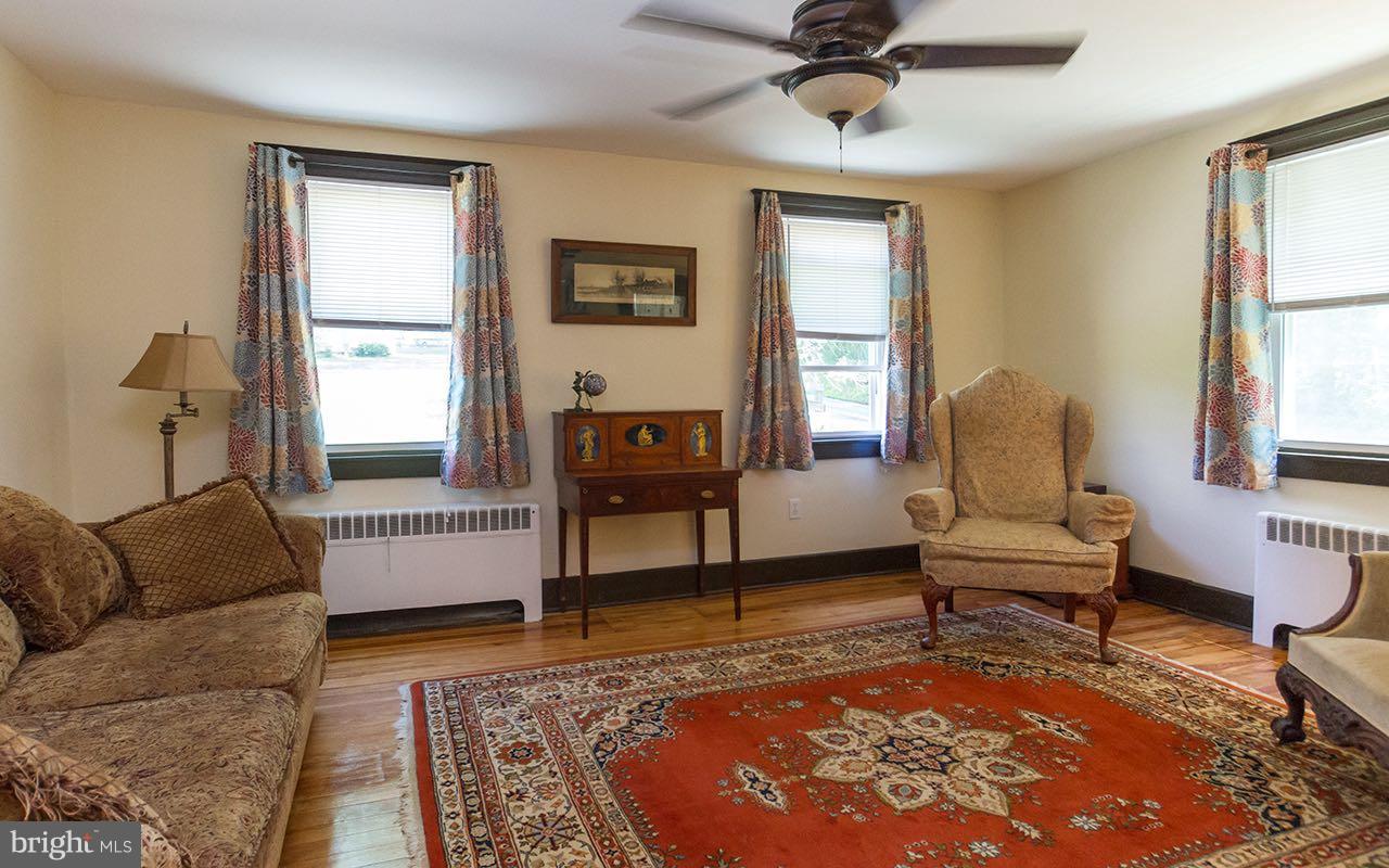 1004 Freeland Road Freeland, MD 21053 - Photo 16 of 30 a living room with furniture and a rug