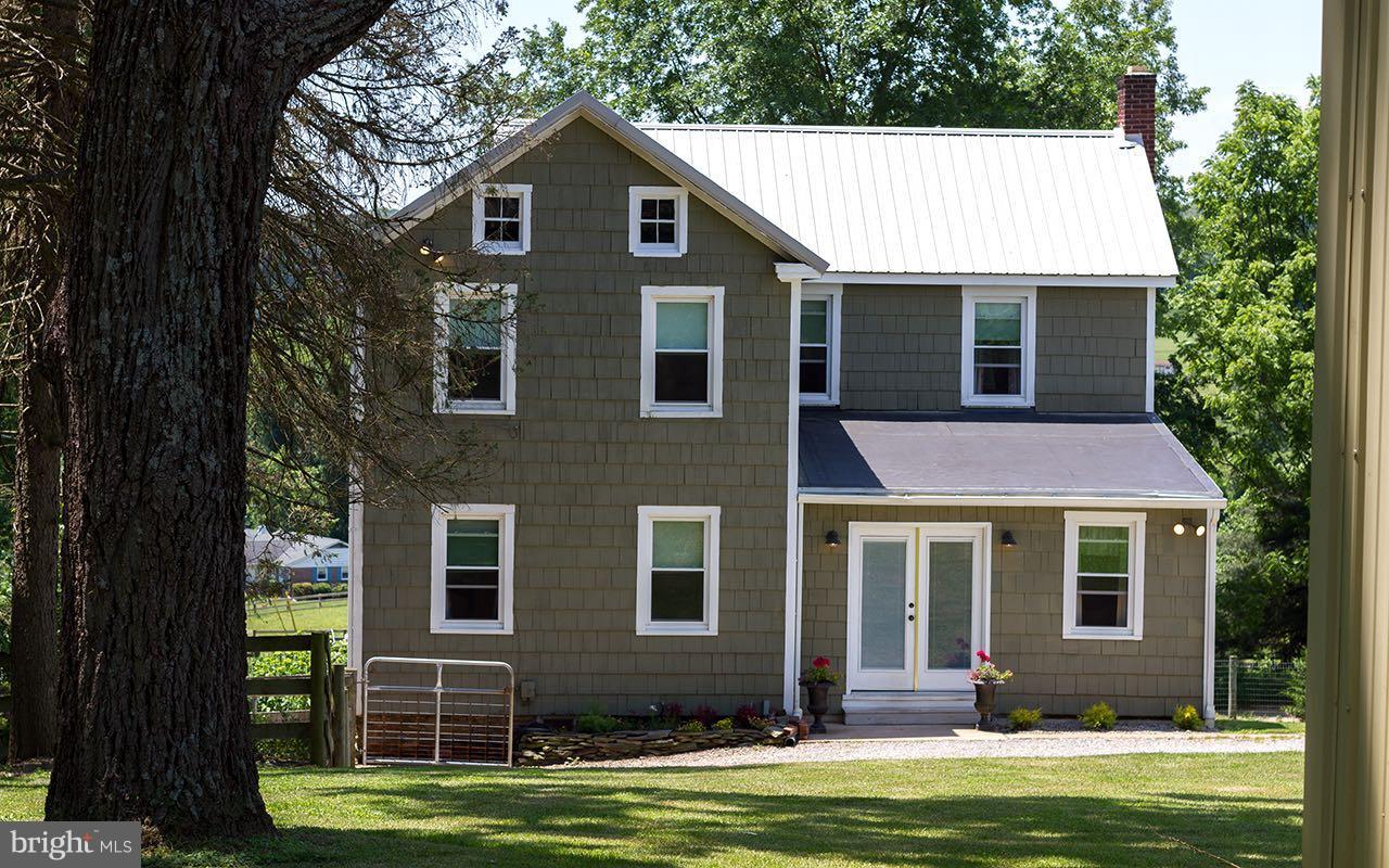 1004 Freeland Road Freeland, MD 21053 - Photo 3 of 30 a front view of a house with a garden