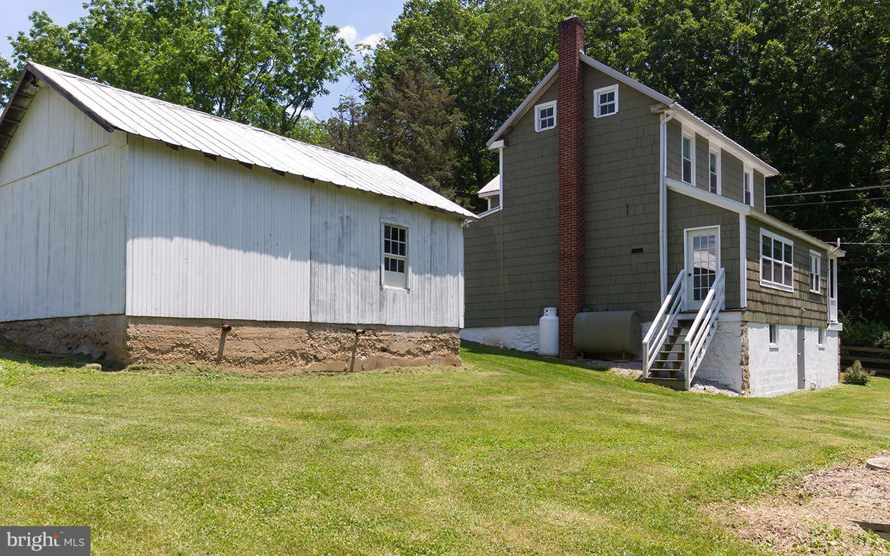 1004 Freeland Road Freeland, MD 21053 - Photo 29 of 30 a view of a house with backyard and sitting area