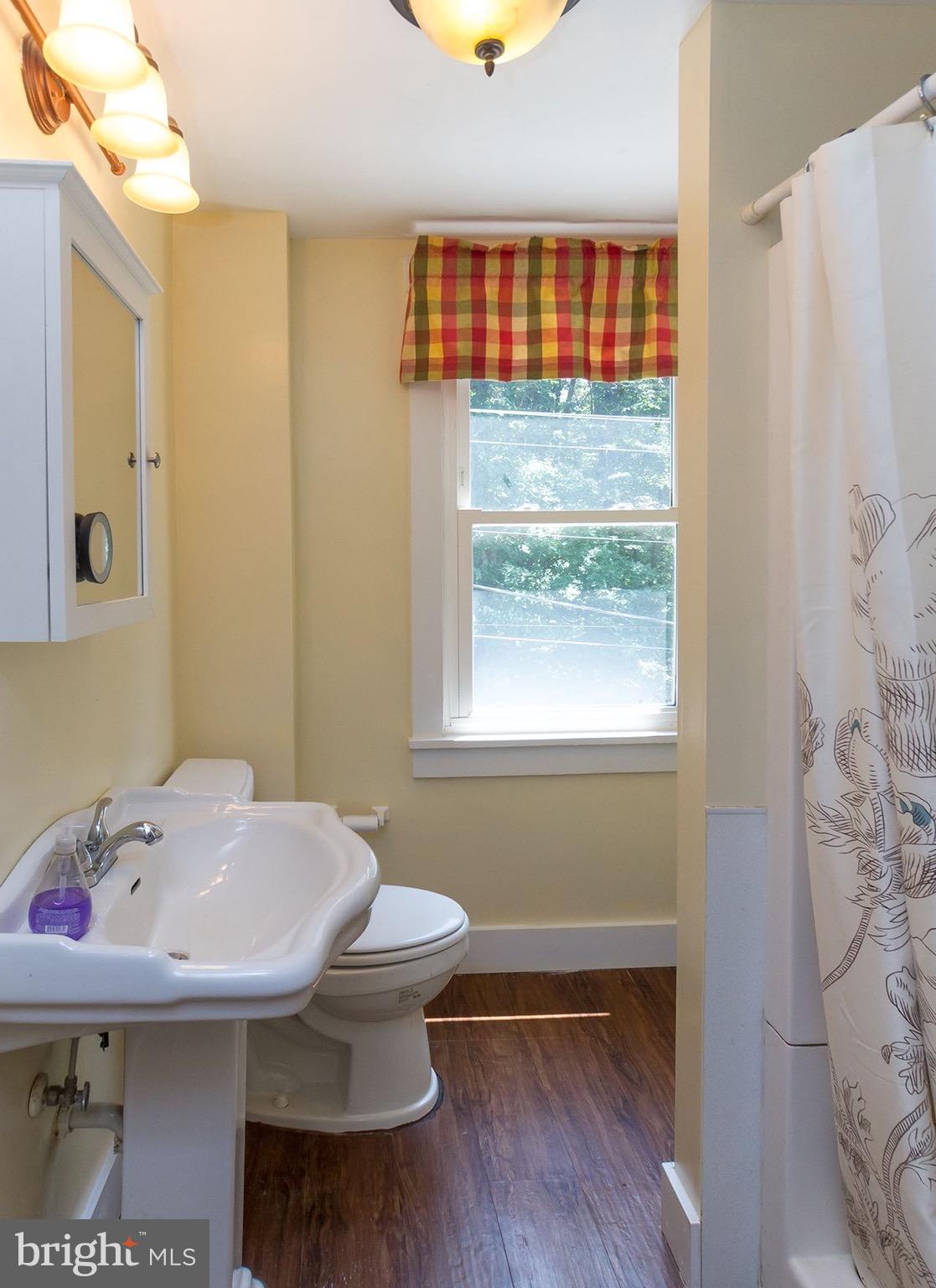 1004 Freeland Road Freeland, MD 21053 - Photo 8 of 30 a bathroom with a sink and a toilet