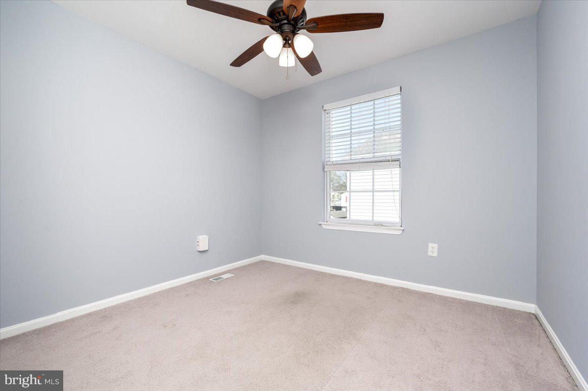 7804 East A E Shore Road Pasadena, MD 21122 - Photo 17 of 35 First Bedroom with Ceiling Fan