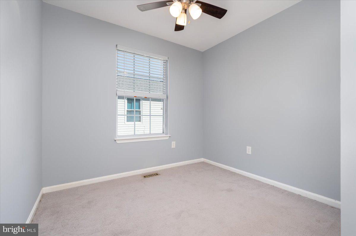 7804 East A E Shore Road Pasadena, MD 21122 - Photo 18 of 35 Second Bedroom with Ceiling Fan