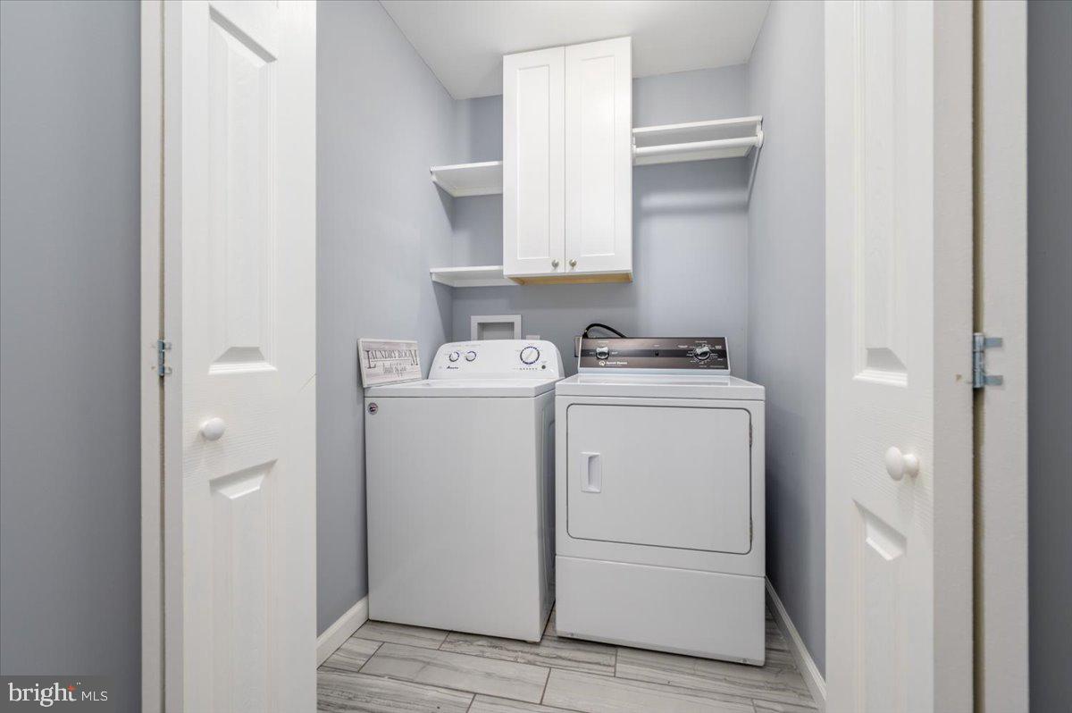 7804 East A E Shore Road Pasadena, MD 21122 - Photo 29 of 34 a utility room with dryer and washer