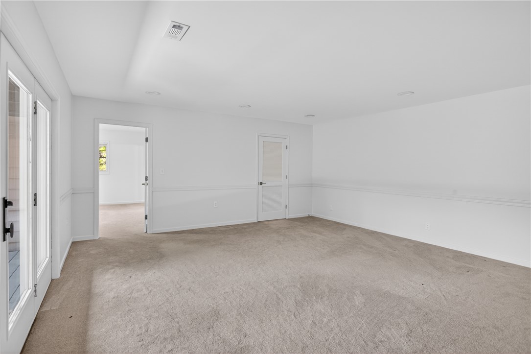 9 Lookout Lane Salem, SC 29676 - Photo 23 of 46 A spacious, naturally illuminated room featuring plush carpeting and convenient outdoor access.