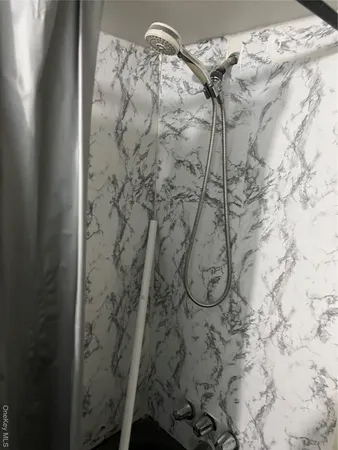 a view of bedroom and bathroom