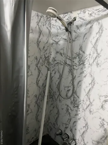 a view of bedroom and bathroom