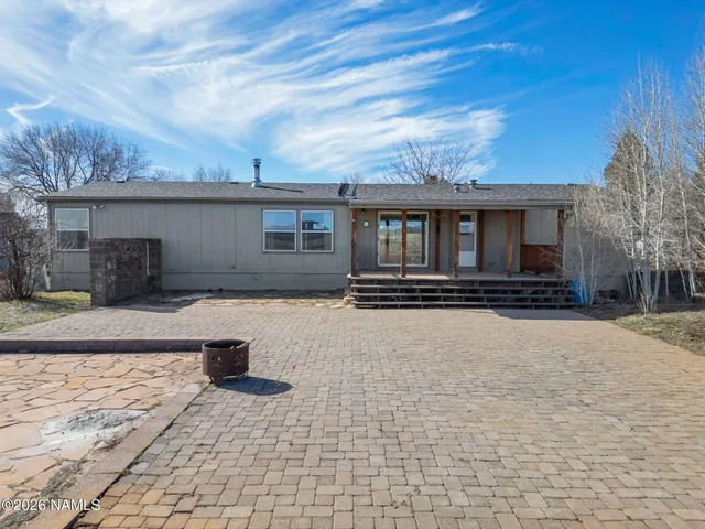 a front view of house with yard