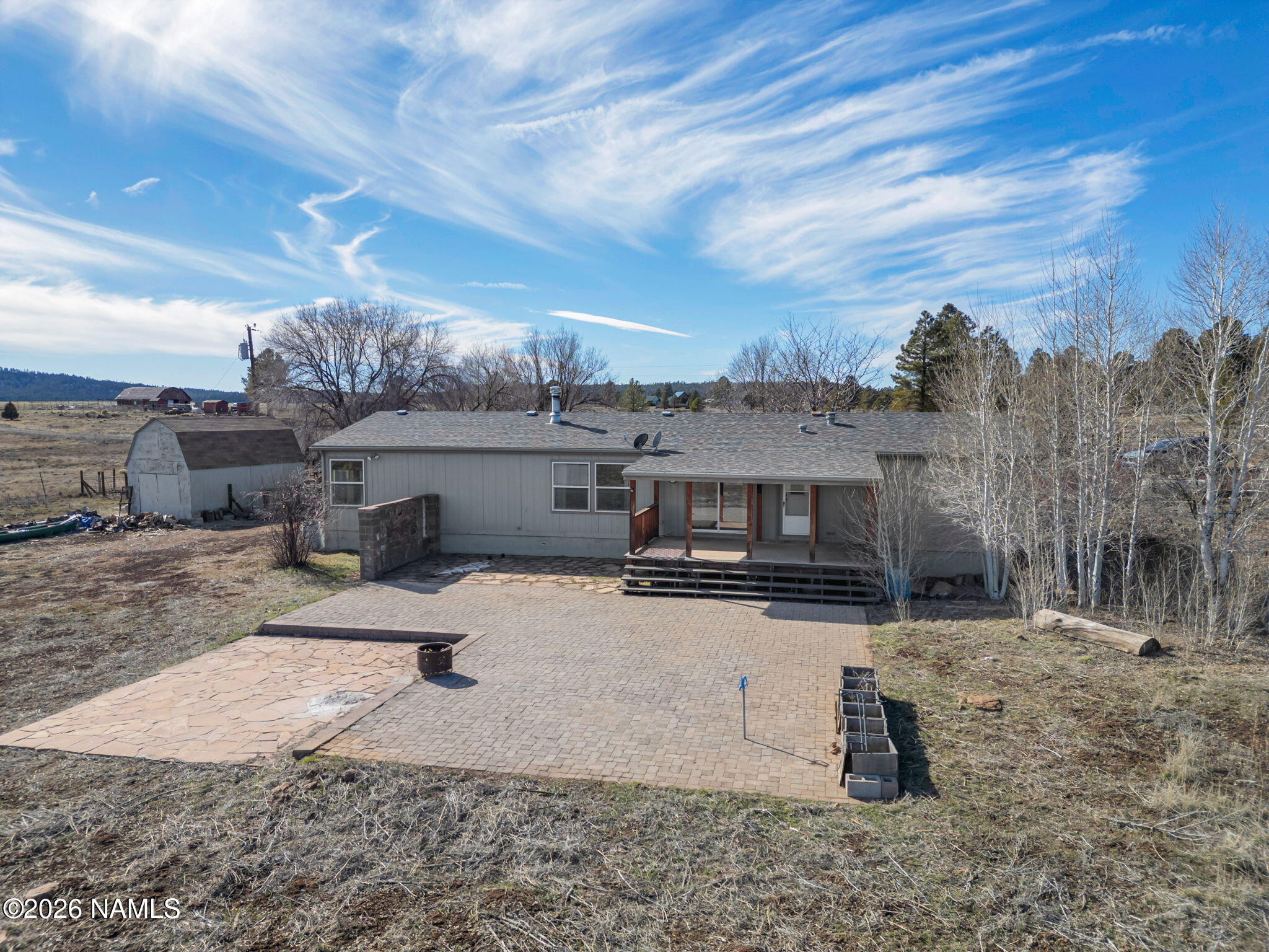 3095 North Peak View Road Williams, AZ 86046 - Photo 33 of 37 a view of a house with a yard