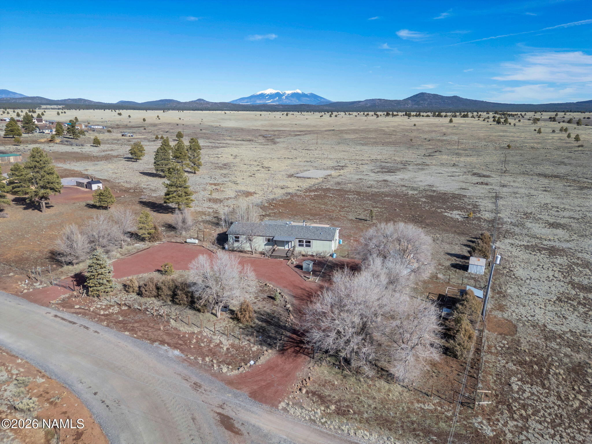 3095 North Peak View Road Williams, AZ 86046 - Photo 35 of 37 a view of a lake with a beach