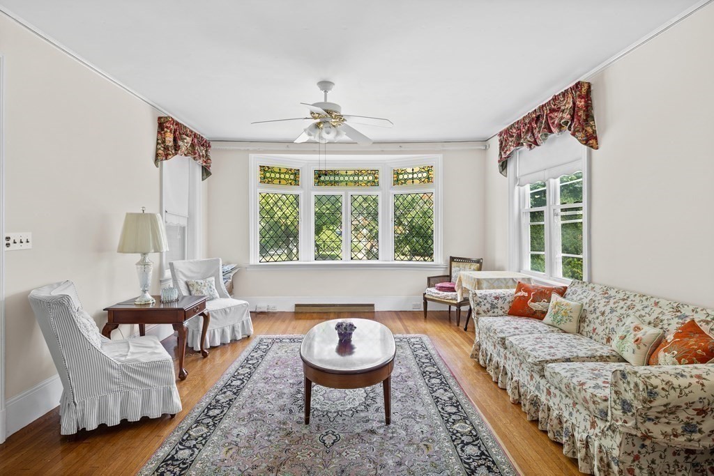130 Dickerman Road Newton, MA 02461 - Photo 4 of 29 a living room with furniture and a large window
