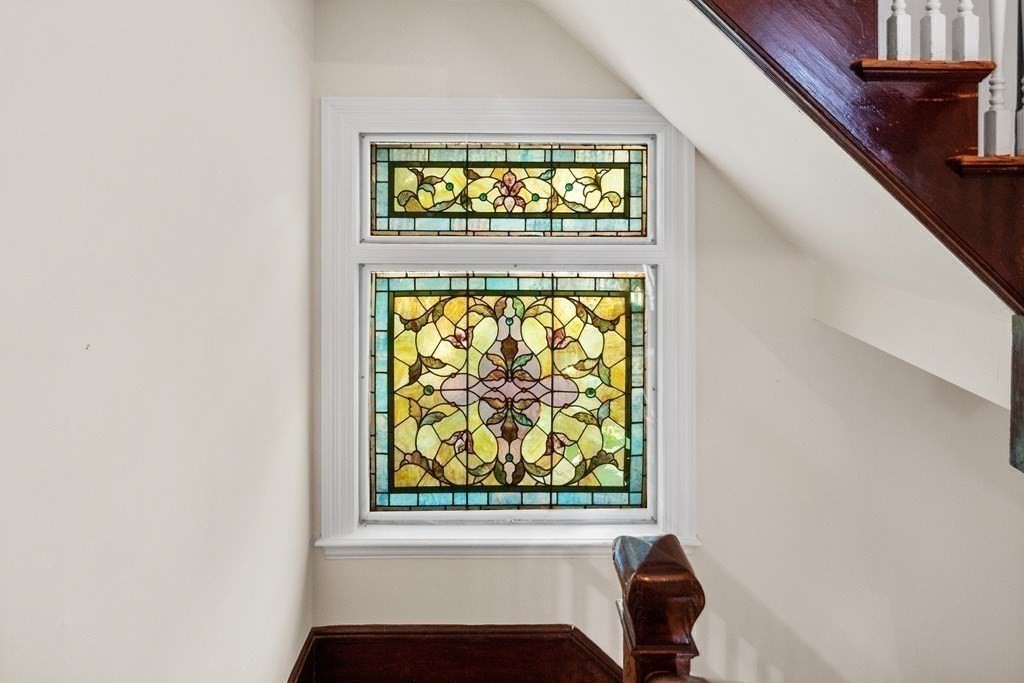 130 Dickerman Road Newton, MA 02461 - Photo 8 of 29 a view of a room that has a bed and a window