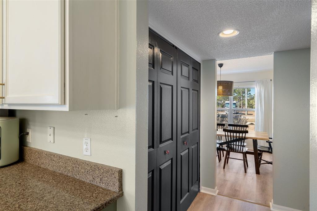 11258 Lomita Wren Road Weeki Wachee, FL 34614 - Photo 23 of 46 a view of a hallway with seating area
