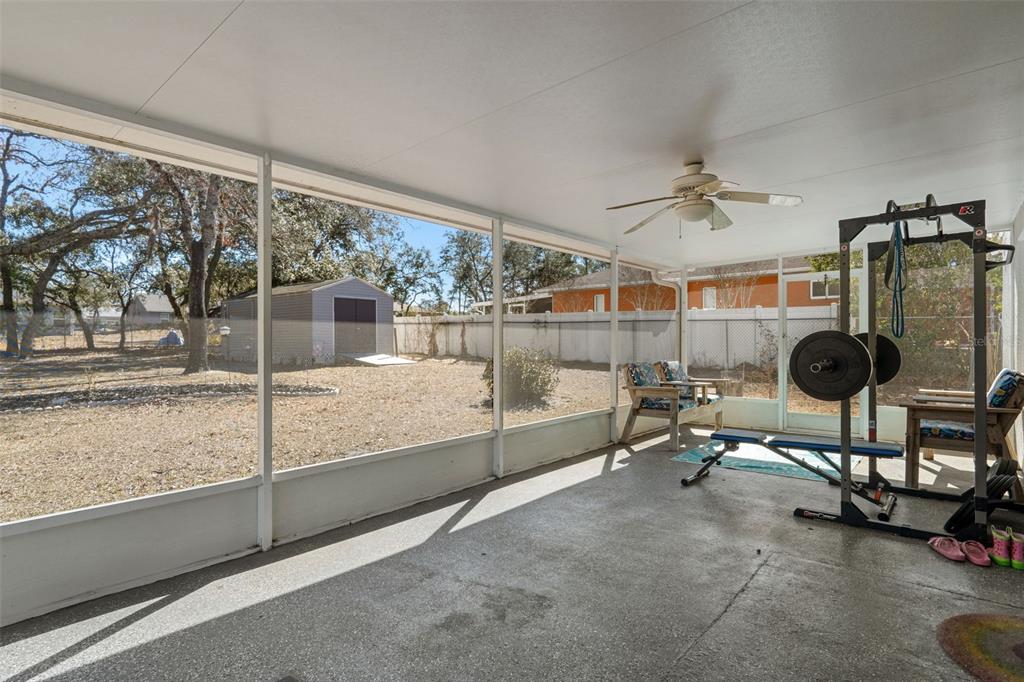 11258 Lomita Wren Road Weeki Wachee, FL 34614 - Photo 40 of 46 a bedroom with furniture and a window