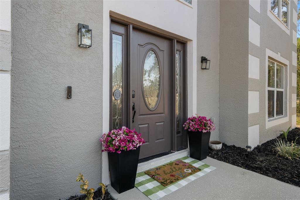 11258 Lomita Wren Road Weeki Wachee, FL 34614 - Photo 4 of 46 a front view of a house