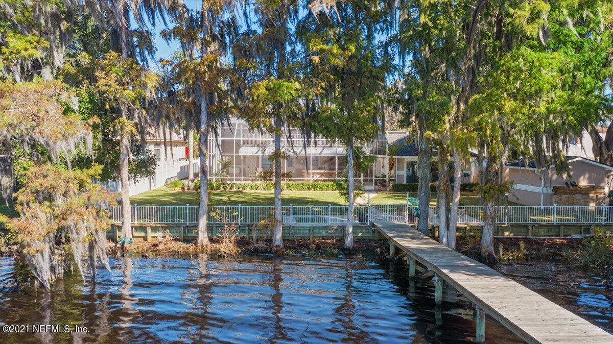 5555 Steamboat Road St. Augustine, FL 32092 - Photo 54 of 54 a view of a brick building with a yard