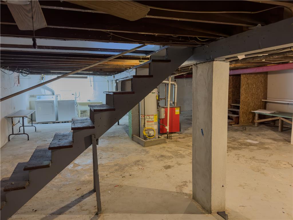 870 Chestnut Street Coplay, PA 18037 - Photo 22 of 24 A spacious, unfinished basement provides ample room for storage and utility.