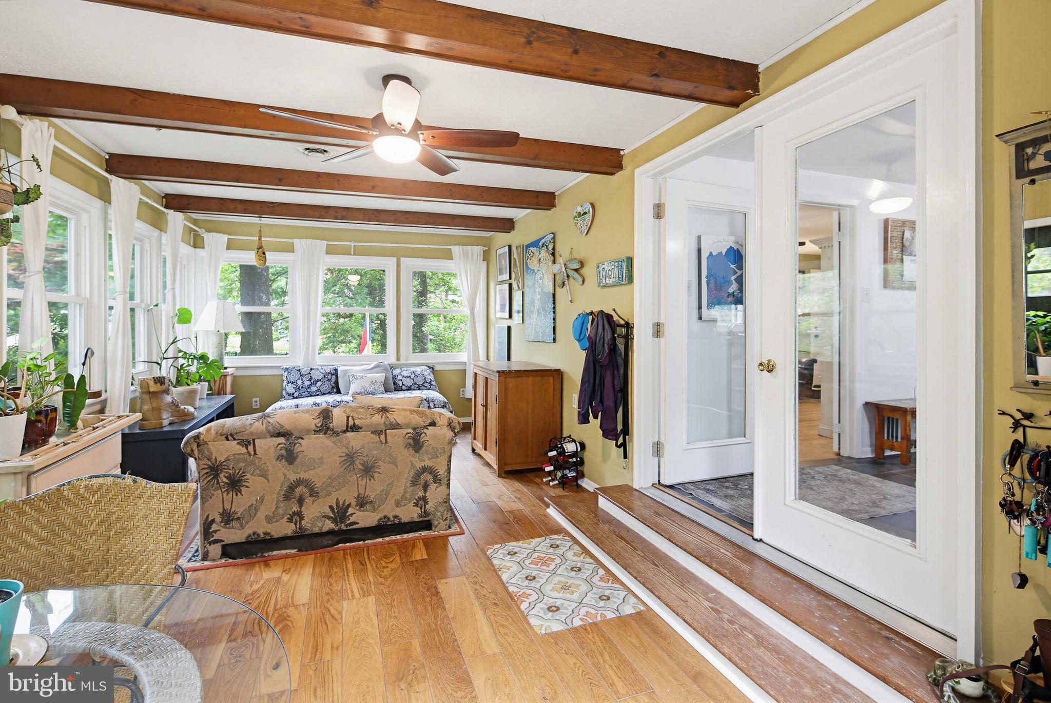 919 Blue Ridge Drive Annapolis, MD 21409 - Photo 26 of 30 a spacious bedroom with a bed and glass door