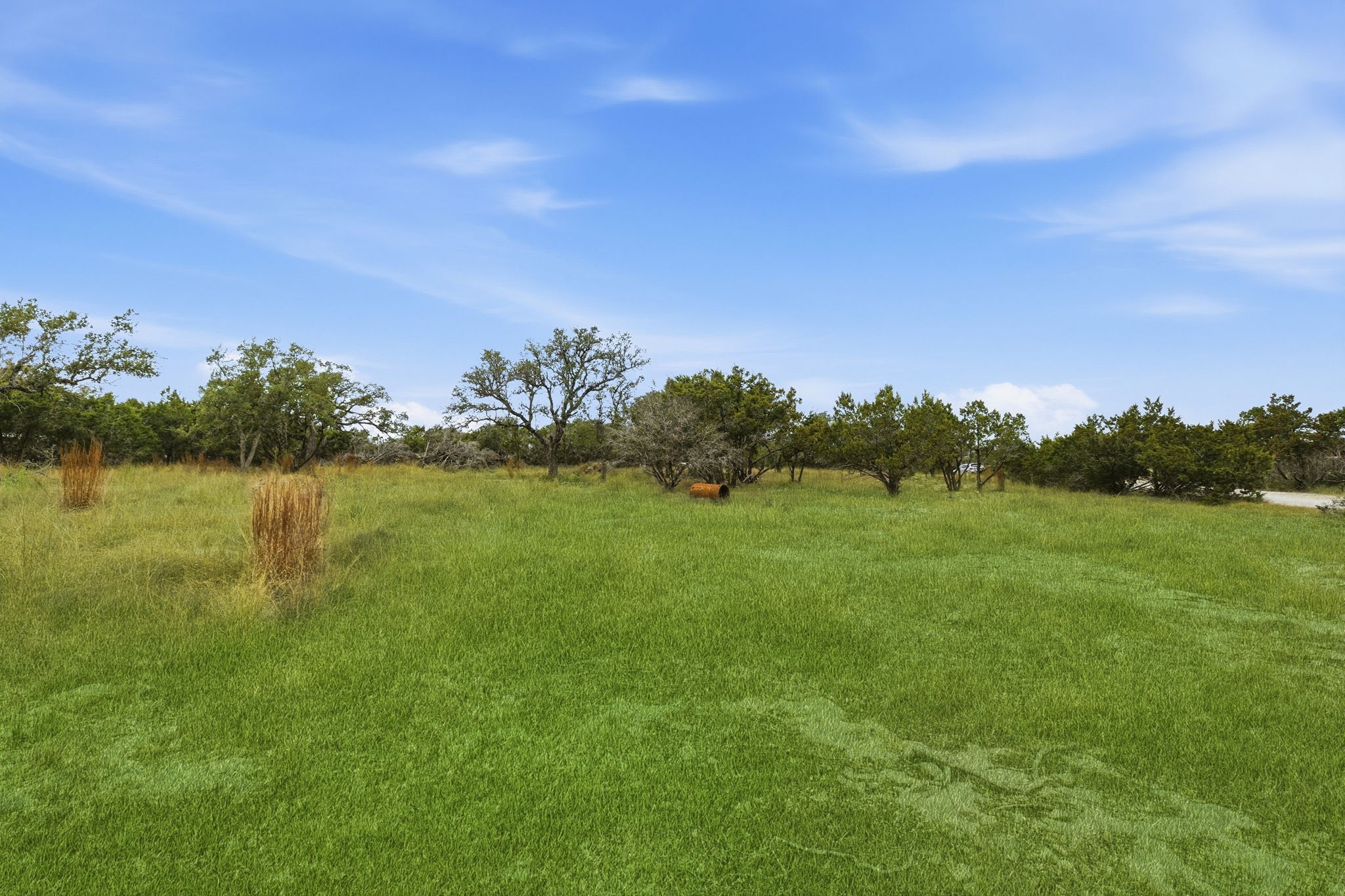 740 Hillcrest Trail Spring Branch, TX 78070 - Photo 12 of 30 a view of a lake from a yard