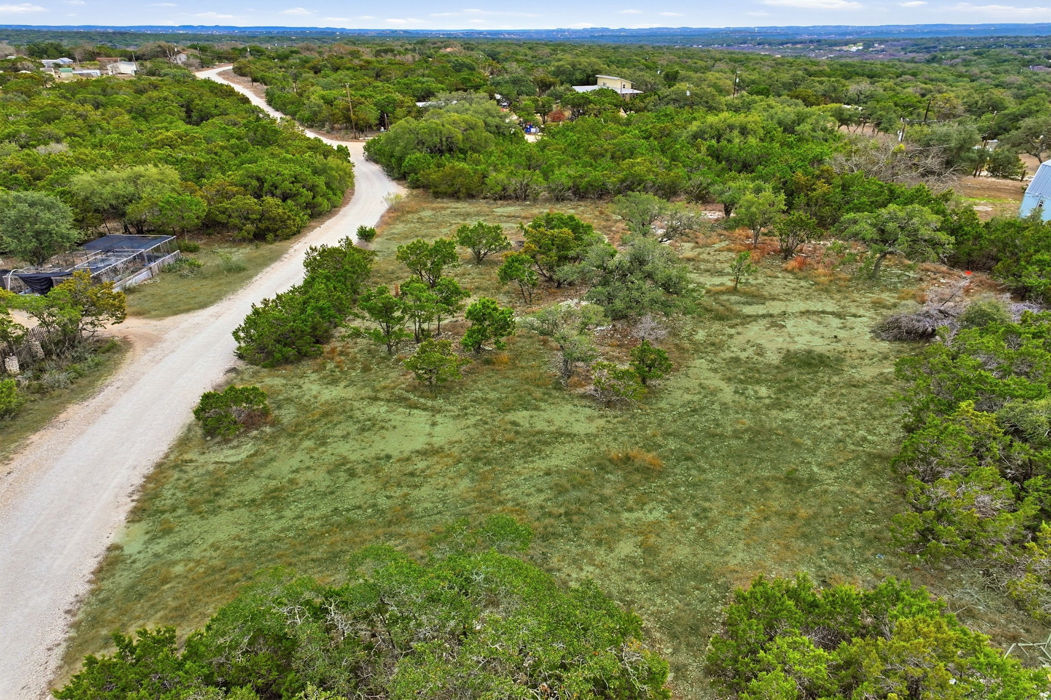 740 Hillcrest Trail Spring Branch, TX 78070 - Photo 18 of 30 a view of a lush green forest with lots of trees