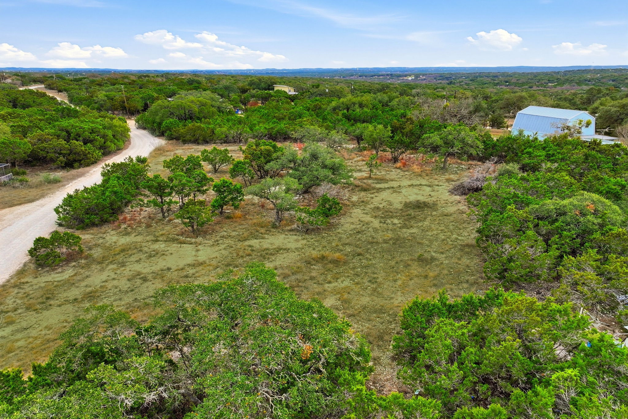 740 Hillcrest Trail Spring Branch, TX 78070 - Photo 19 of 30 a view of a lake with a yard