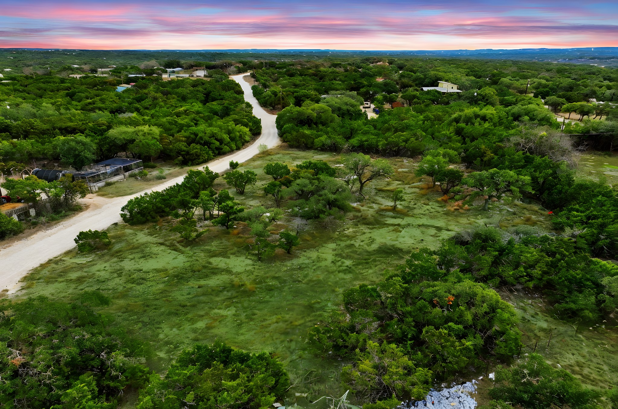 740 Hillcrest Trail Spring Branch, TX 78070 - Photo 2 of 30 a view of a city with lush green forest