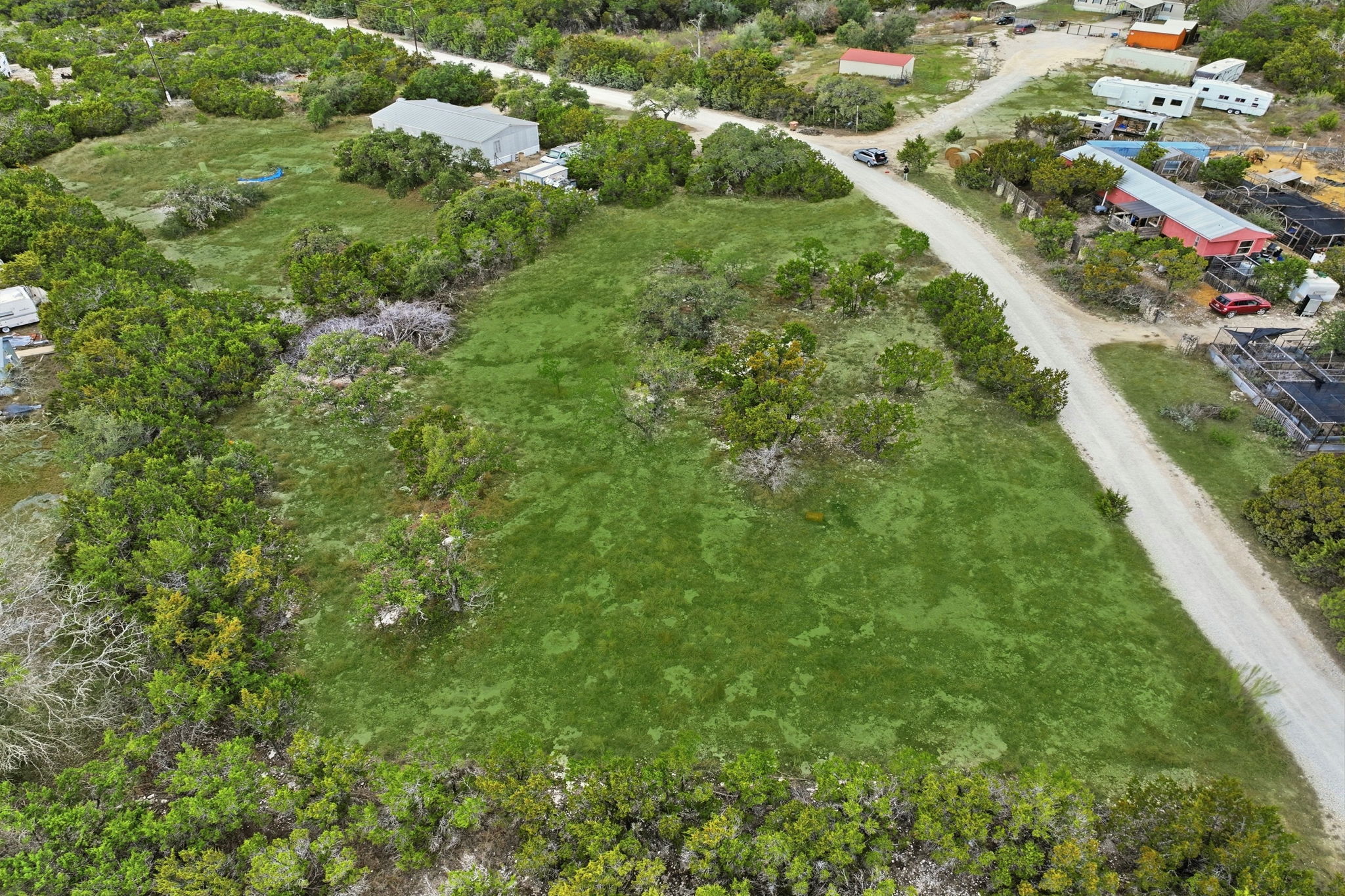 740 Hillcrest Trail Spring Branch, TX 78070 - Photo 23 of 30 an aerial view of residential houses with outdoor space and trees