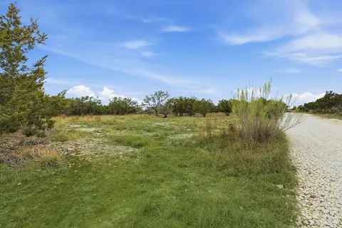 a view of a lake from a yard