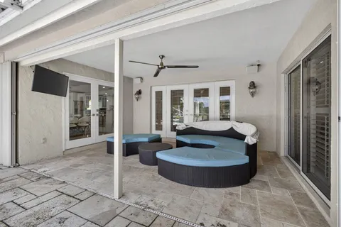 a view of yard with table and chairs