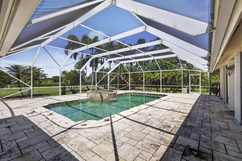 a view of a house with a swimming pool