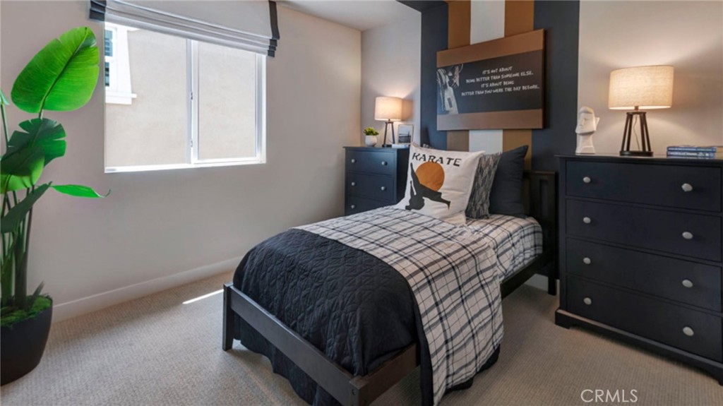 533 Havasu Way Rialto, CA 92377 - Photo 15 of 21 a bedroom with a bed and a lamp