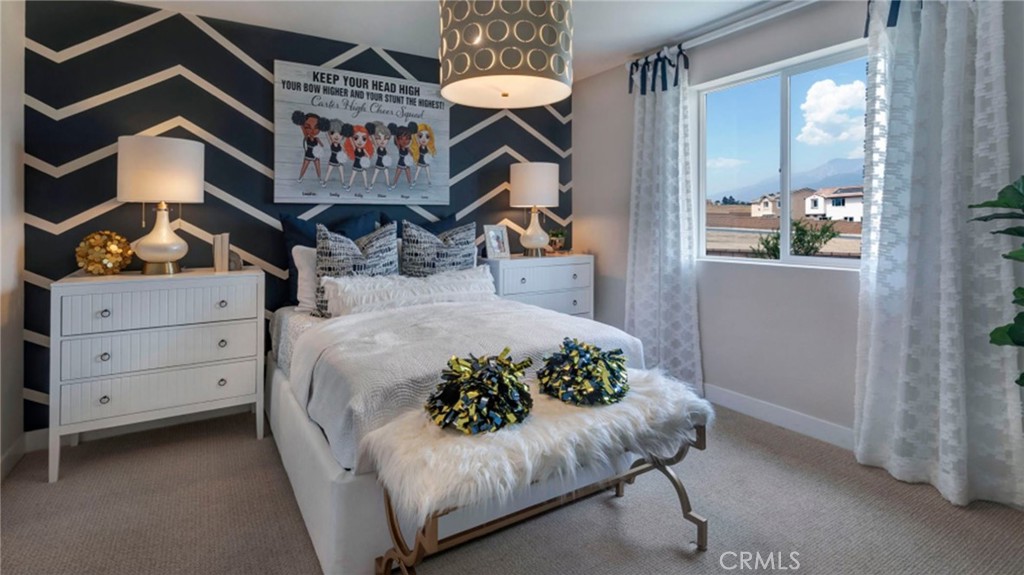 533 Havasu Way Rialto, CA 92377 - Photo 17 of 21 a bed room with a bed and a painting on the wall