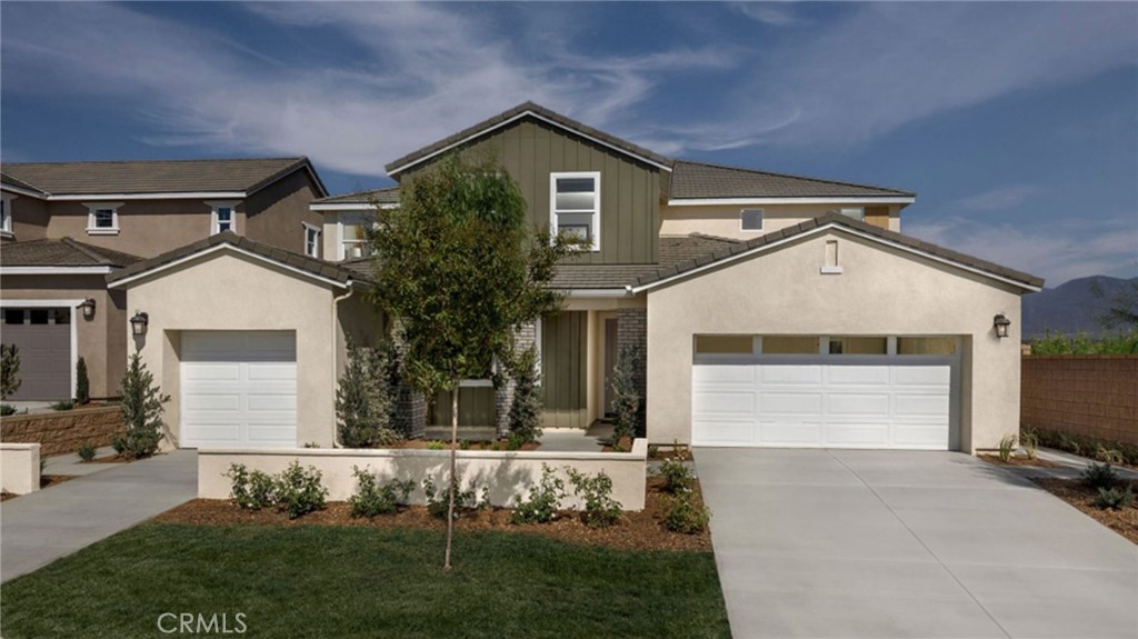 533 Havasu Way Rialto, CA 92377 - Photo 18 of 21 a front view of a house with a yard and garage