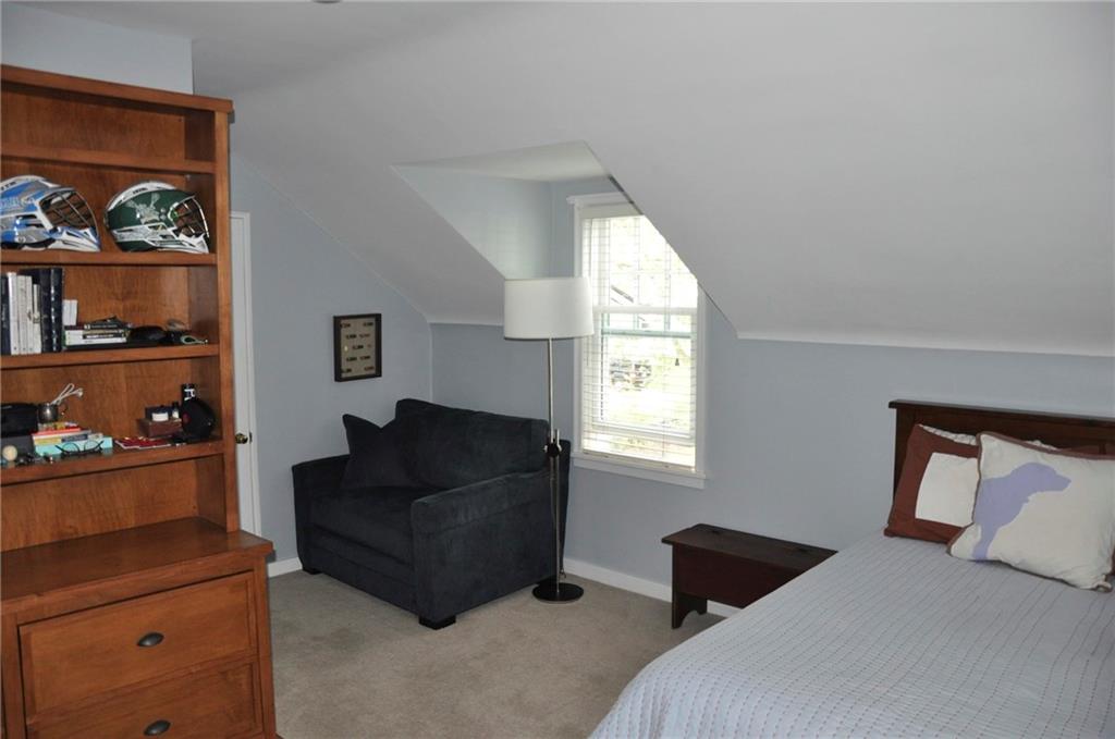 303 Pine Road Edgeworth, PA 15143 - Photo 18 of 24 a living room with furniture and window