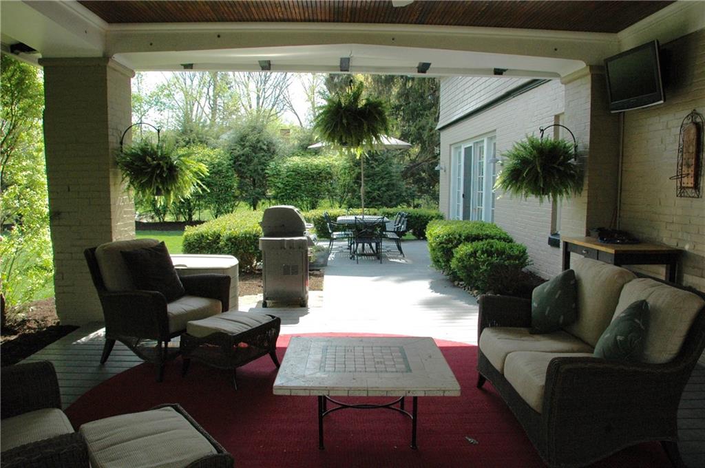 303 Pine Road Edgeworth, PA 15143 - Photo 22 of 24 a outdoor living space with furniture and a potted plant
