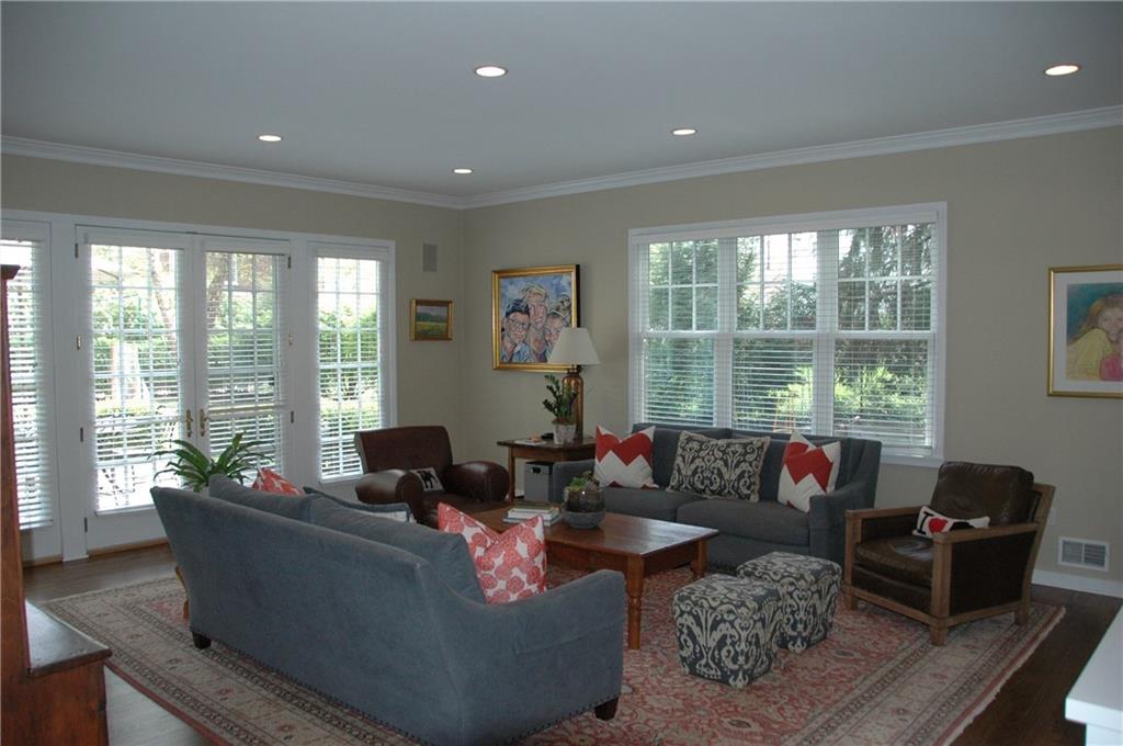 303 Pine Road Edgeworth, PA 15143 - Photo 3 of 24 Living Room has 10' ceiling, French doors to terrace, large windows and hardwood floors.