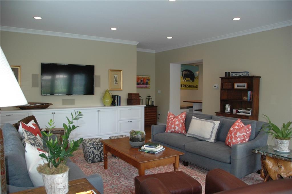 303 Pine Road Edgeworth, PA 15143 - Photo 4 of 24 a living room with furniture and a flat screen tv