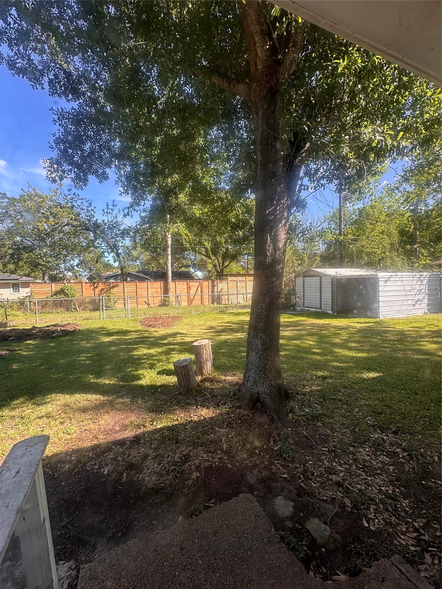 1607 Klauke Street Rosenberg, TX 77471 - Photo 14 of 17 a view of a large yard with large trees