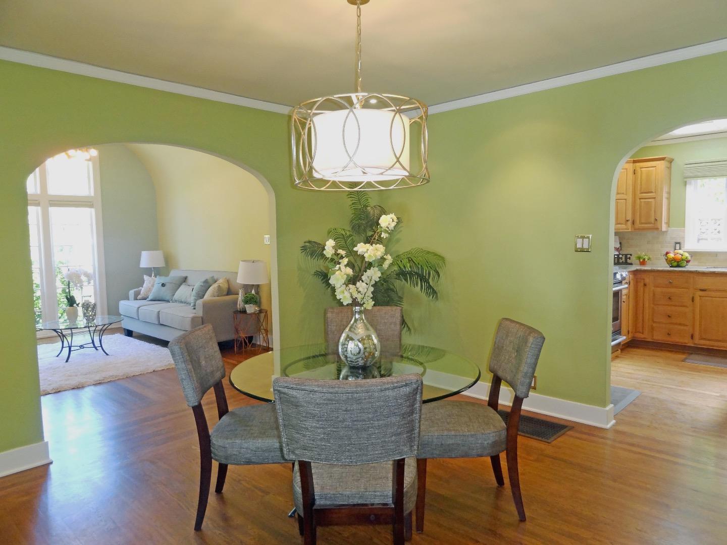16760 Magneson Loop Los Gatos, CA 95032 - Photo 11 of 20 a dining room with furniture and wooden floor