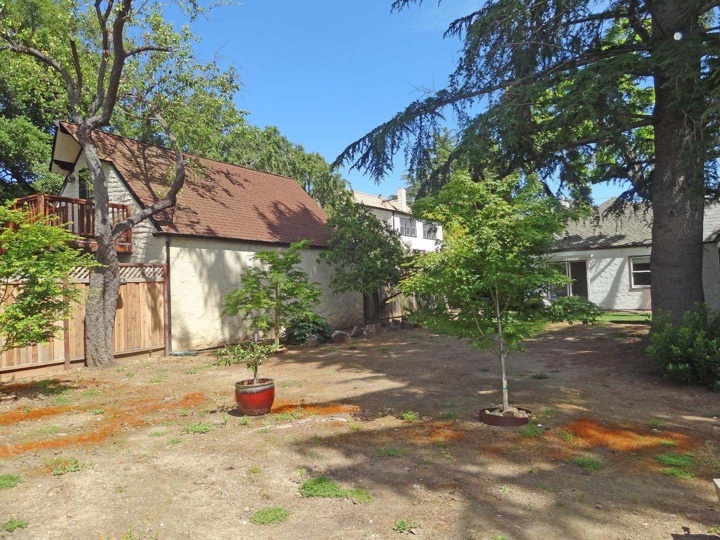 16760 Magneson Loop Los Gatos, CA 95032 - Photo 20 of 20 a view of a yard with plants and trees